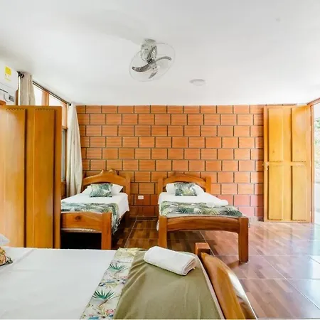 Arca Tayrona Restaurant & Hostal Los Naranjos Exterior photo