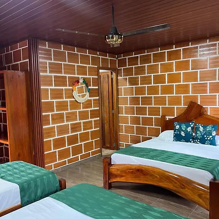 Arca Tayrona Restaurant & Hostal Los Naranjos Exterior photo